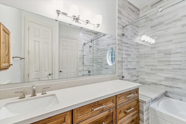 bathroom featuring separate shower and tub and vanity