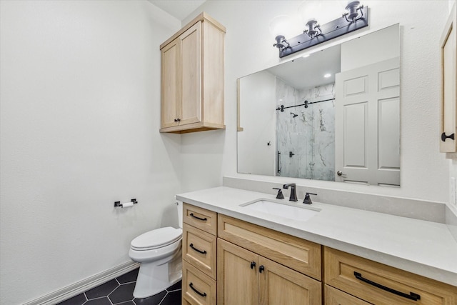 bathroom with tile patterned flooring, vanity, toilet, and a shower with door