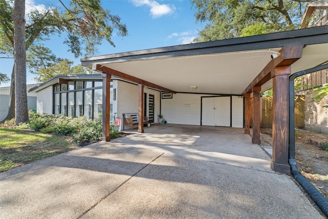 exterior space featuring a carport