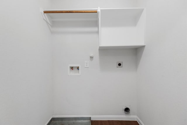 laundry room featuring gas dryer hookup, washer hookup, wood-type flooring, and hookup for an electric dryer