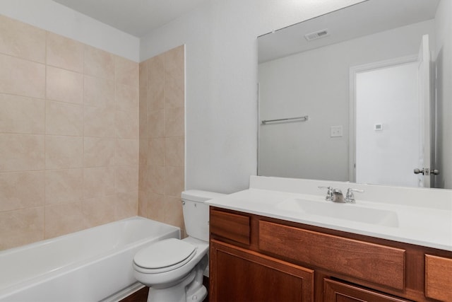 full bathroom featuring vanity, toilet, and  shower combination