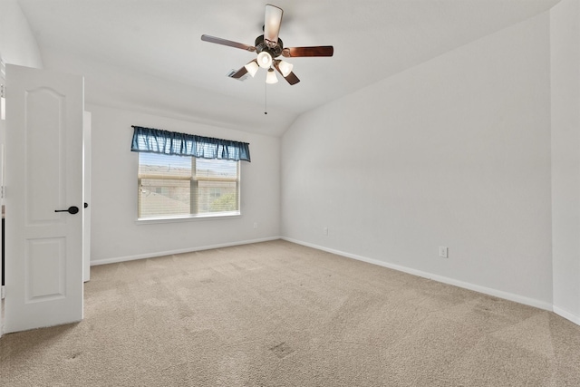 9147 Monarch Mist Ln, Houston, TX 77070 - carpeted empty room with baseboards, vaulted ceiling, and ceiling fan