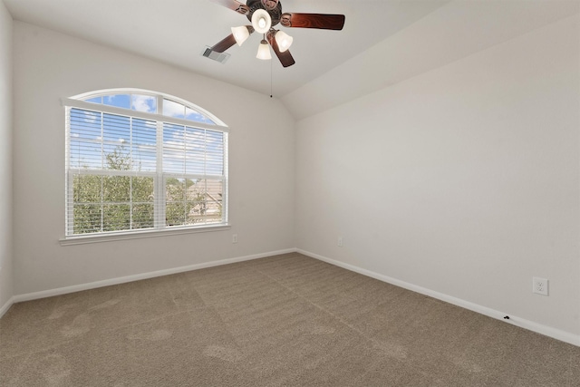 9147 Monarch Mist Ln, Houston, TX 77070 - carpeted spare room featuring a ceiling fan, baseboards, lofted ceiling, and visible vents