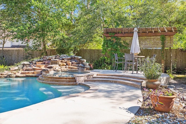 view of pool with a pergola and a patio