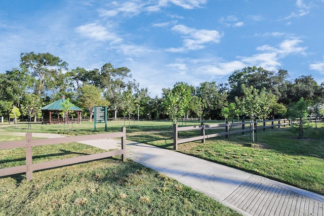 view of property's community featuring a gazebo and a lawn