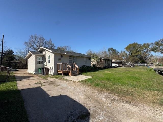 exterior space with a front lawn