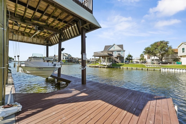 dock area with a water view