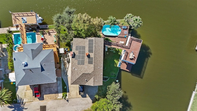 bird's eye view with a water view