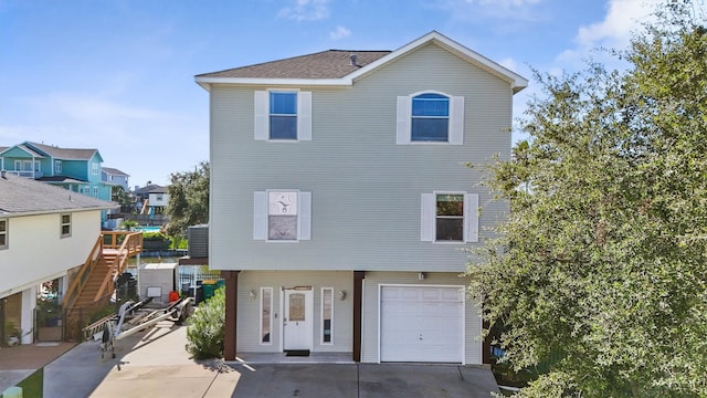 view of front of property with a garage