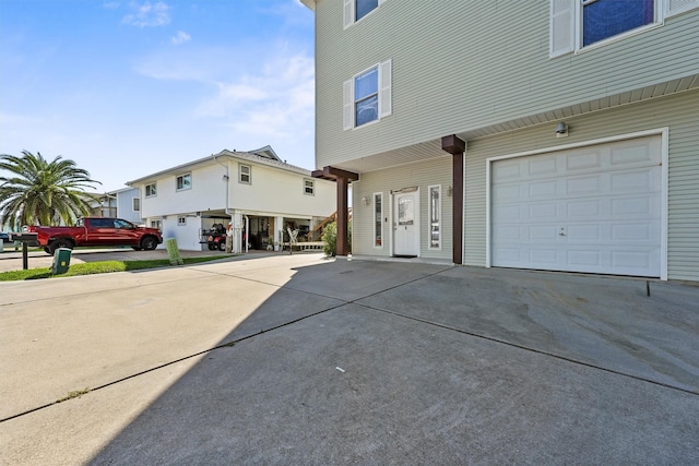 view of side of home with a garage