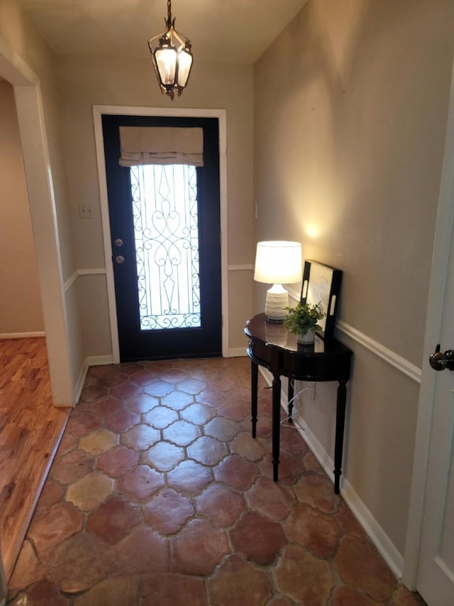 entrance foyer with baseboards