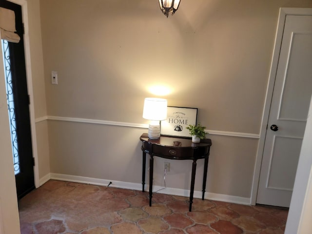 interior space with baseboards