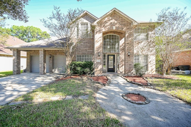 view of front of property with a garage