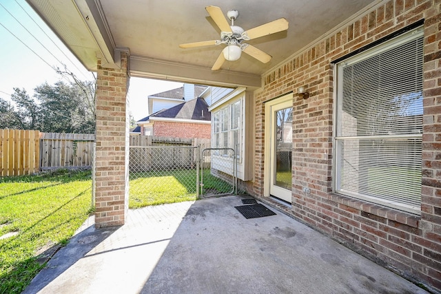 view of patio featuring ceiling fan