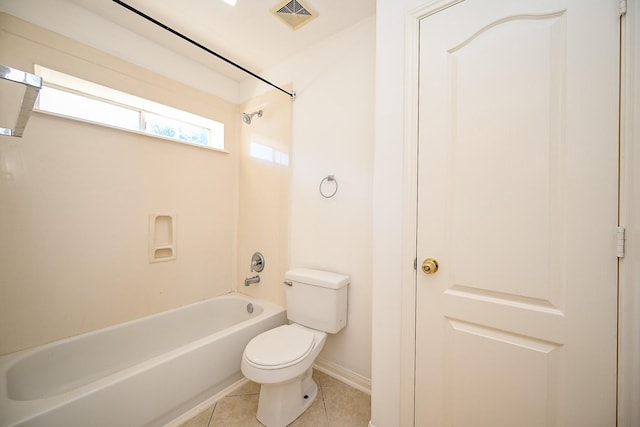 bathroom featuring tile patterned flooring, toilet, and shower / bath combination