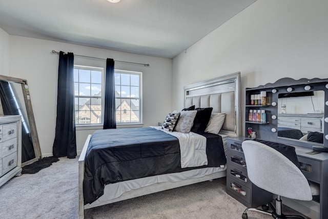 bedroom featuring carpet