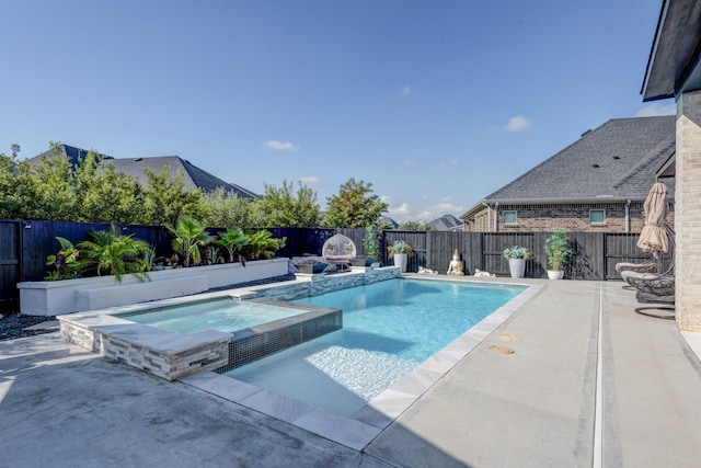 view of pool with a patio and a fenced backyard