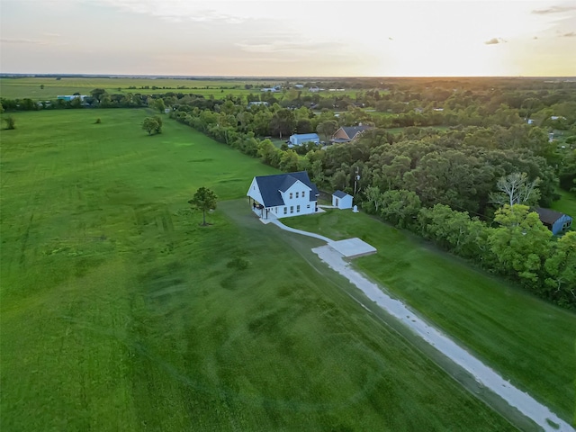 aerial view at dusk with a rural view