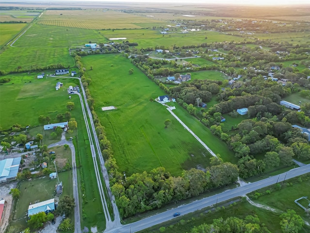 birds eye view of property featuring a rural view