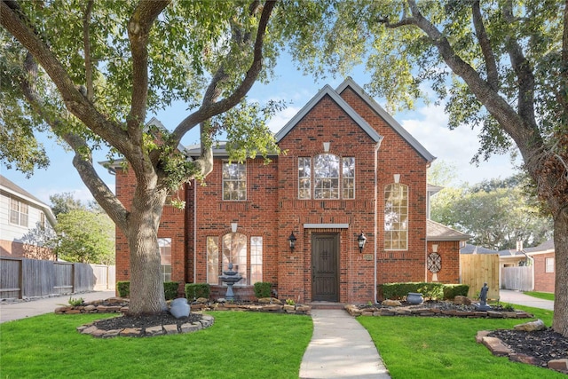 view of front of home with a front lawn