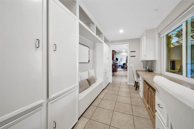 interior space featuring light tile patterned floors