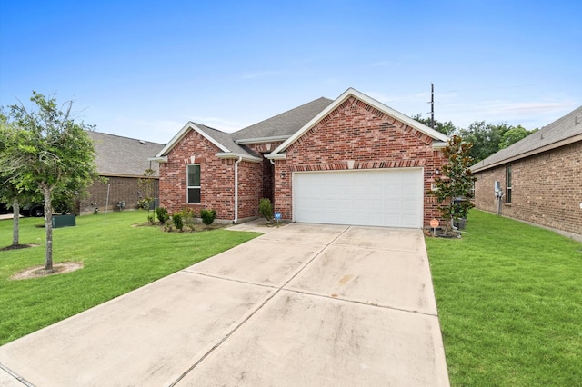 view of front of home featuring a front lawn and a garage