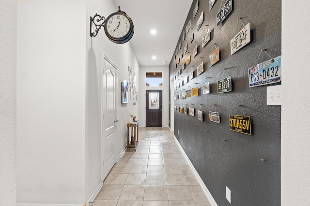 hallway with light tile patterned flooring