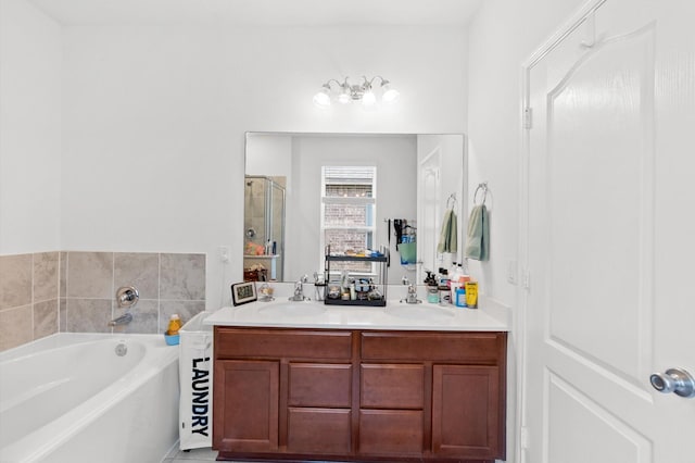 bathroom featuring vanity, tile patterned flooring, and plus walk in shower