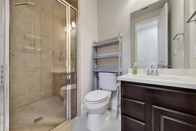 bathroom with toilet and a shower with door