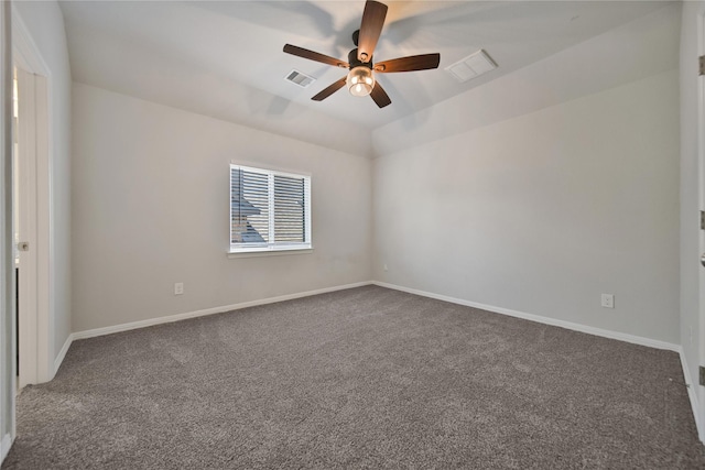 carpeted spare room featuring ceiling fan