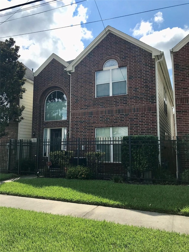 view of front of home with a front yard