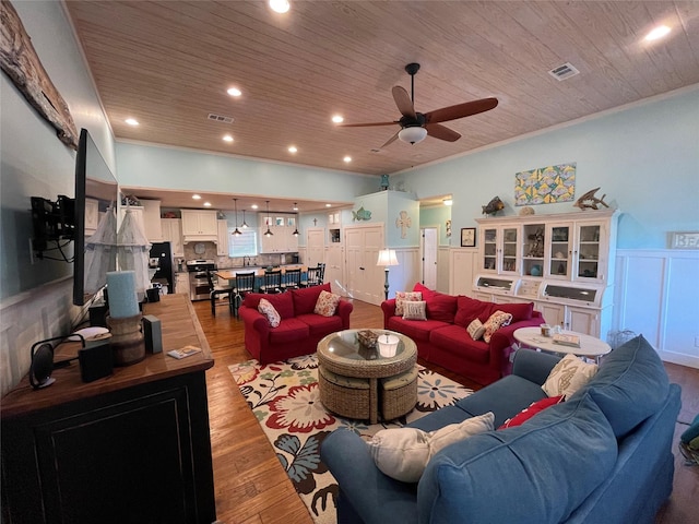 living room featuring light wood-type flooring, ceiling fan, ornamental molding, and wood ceiling