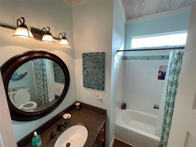 full bath featuring vanity, shower / bath combination with curtain, and toilet