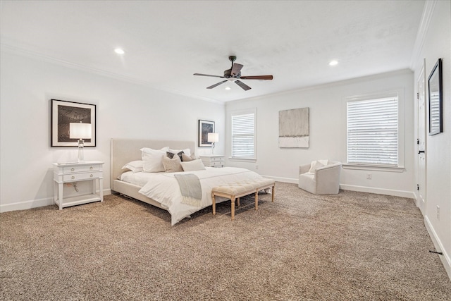 carpeted bedroom featuring multiple windows, ceiling fan, and crown molding