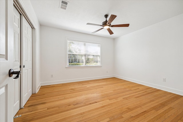 unfurnished bedroom with light hardwood / wood-style flooring and ceiling fan