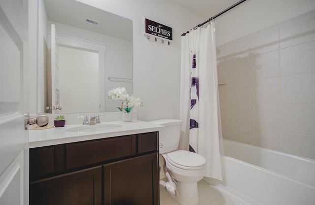 full bathroom featuring vanity, toilet, and shower / bath combo with shower curtain