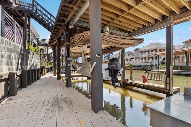 dock area featuring a water view