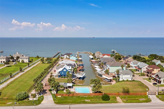 birds eye view of property featuring a water view