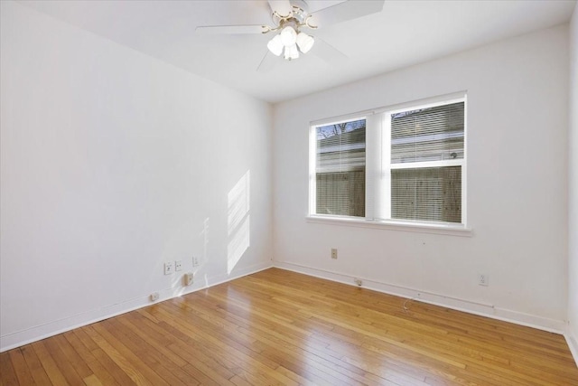 unfurnished room with light hardwood / wood-style flooring and ceiling fan