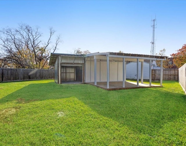 view of outbuilding featuring a yard