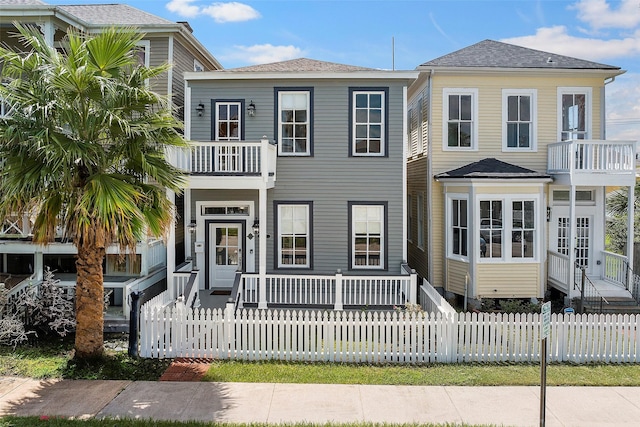 view of front of property with a balcony