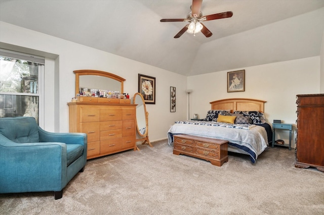 bedroom featuring light carpet, ceiling fan, and lofted ceiling