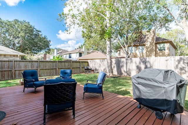 wooden terrace featuring outdoor lounge area and a grill