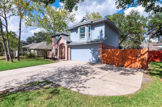 view of front of home featuring a front yard and a garage