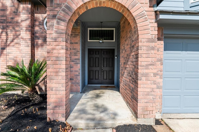 entrance to property with a garage