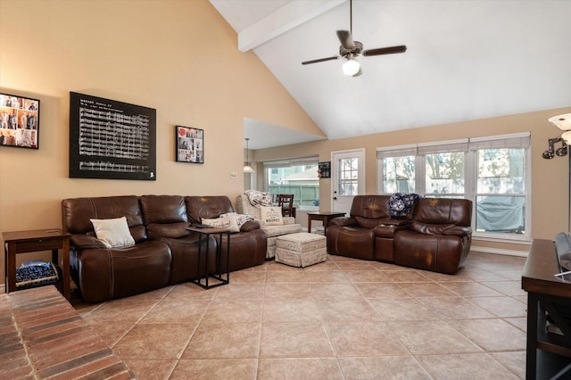 living room with ceiling fan, beamed ceiling, light tile patterned floors, and high vaulted ceiling