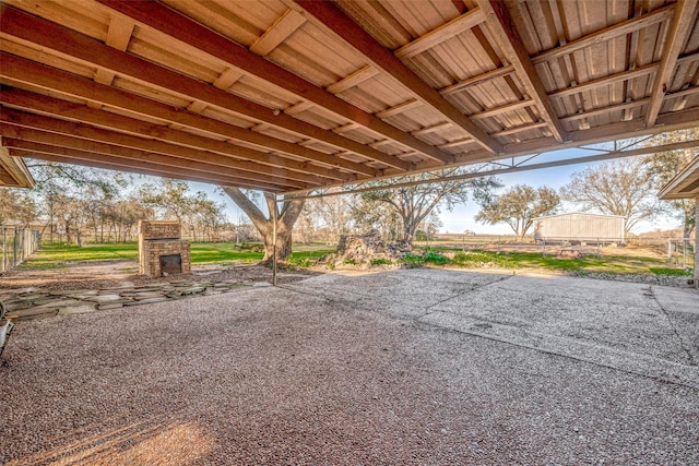 view of patio / terrace with an outdoor stone fireplace