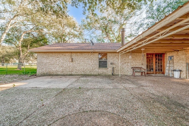 back of property featuring a patio