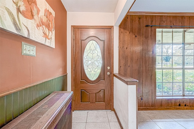 tiled entrance foyer with wooden walls