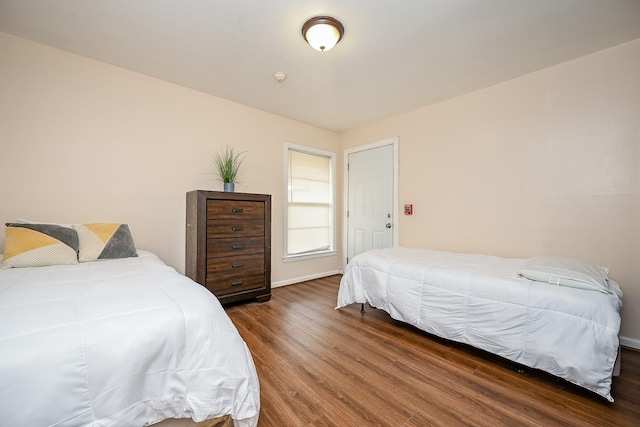 bedroom with wood-type flooring